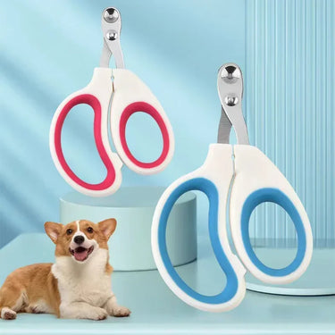 Two PawPerfect Pro Elite Trimmers by KittyNook Cat Co. with red and blue handles keep your dog happy and nails neat.